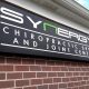 Synergy chiropractic store front push through cabinet sign with led illumination